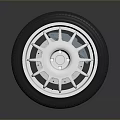 Car Wheel Rim And Tire Design With White Spokes And Black Rubber Tread