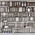 Various Wooden Window Frames With Different Designs Arranged On Wall 3d model