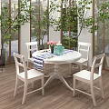 Modern Restaurant Interior Design With Dining Table Colorful Chairs Pendant Lights And Indoor Plant