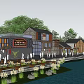 Evening Commercial Street With Traditional Modern Buildings Waterfront Pedestrian Area And People Walking