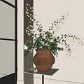 Brown Woven Vase With Pink And White Flowers Green Leaves Near Window Curtains