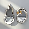 Modern Metallic Decorative Mirrors With Unique Curved Shapes And Gold Accents For Contemporary Interior Design
