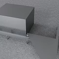 Gray Structural Cube Mounted On Metal Support Frame With Legs