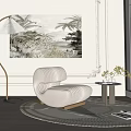 Cream Colored Curved Single Sofa With Floor Lamp Round Rug Small Side Table And Decorative Painting