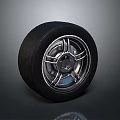 Car Tire with Black Tread and Silver Spoke Alloy Wheel Rim Design