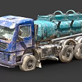 Old Blue Tanker Truck With Large Green Storage Tank Multiple Wheels And Worn Exterior