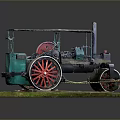 Vintage Steam Roller Model With Detailed Green Red Design On Grass Base