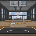 Spacious Indoor Basketball Court With Wooden Flooring Hoops Digital Scoreboard And Large Windows