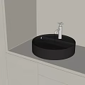 Modern Bathroom Round Black Washbasin With Silver Faucet And White Countertop