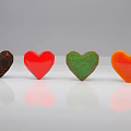 Colorful Heart Shaped Objects With Diverse Textures And Reflections On Gray Background 3d model