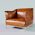 Brown Leather Armchair Featuring Modern Design And Metal Legs For Stylish Living Room Interior