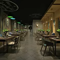 Lush Green Plant Decorated Restaurant Interior With Wooden Ceiling Hanging Lights Stone Walls And Colorful Chairs