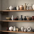 Minimalist Ceramic Vessels Display On Wooden Shelves With Neutral Gray Wall Background