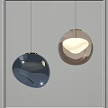 Shiny Modern Spherical Metallic Pendant Lights Dark And Light Illuminated Design