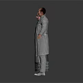Man in Gray Formal Suit Standing with Two Other Figures on White Background