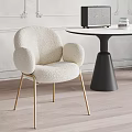 Beige Fleece Dining Chair With Golden Legs And Black Round Table