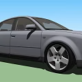 Gray Sedan Car With Sleek Side View And Large Alloy Wheels