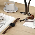 Elegant Decorative Ornament Combination on Wooden Table with Vase Coffee Cup Lamp Magazine and Watch