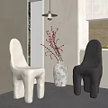 Modern Unique White And Black Dining Chairs In Kitchen Interior With Vase Branches