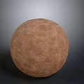 Homemade Artisanal Rustic Round Brown Cracked Bread Displayed on Simple Gray Background