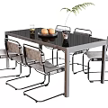 Modern Dining Table Set With Black Tabletop Six Chairs Fruits Glass And Plant