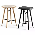 Two Modern Stools With Light And Dark Upholstered Seats And Wooden Legs