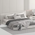 Modern Double Bed With Plush Pillows Blanket Nightstands Lamps Gray Rug And Stuffed Toy