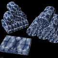 Blue and White Tie Dye Towels in Folded and Unfolded Styles for Home Use