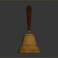 Golden Bell with Wooden Handle and Polished Brass Surface on Black Background