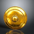 Ancient Golden Circular Shield With Decorations And Worn Marks On Gray Background