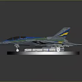 Military Fighter Jet Model With Green Blue Yellow Stripes And Missiles On Display Base