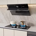 Black Range Hood Gas Stove with Blue Flames White Pot Golden Handle on Marble Countertop