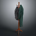 Wooden Coat Rack with Tripod Base Hanging Green and Gray Coats
