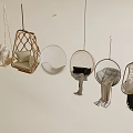 Stylish Hanging Chairs in Various Rattan and Cushioned Designs for Modern Home Decor