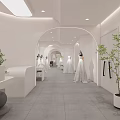 Bridal Shop Interior With White Wedding Dresses On Mannequins And Archways
