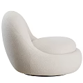 Modern Cream Colored Accent Chair With Curved Design And Soft Plush Fabric