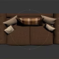 Classic Brown Leather Two Seater Sofa With Plaid And Beige Patterned Cushions And Curved Arms