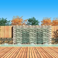 Outdoor Water Wall With Wooden Deck Pool Stone Accents And Trees With Green Orange Foliage