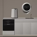 Modern Wall Mounted Washing Machine With White Storage Cabinets In Laundry Room Design