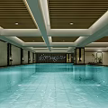 Modern Indoor Swimming Pool Interior With Wooden Ceiling And Relaxation Loungers