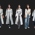 Women wearing white coats with different bottoms against black background in fashion shoot