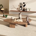 Wooden Curved Coffee Table with Open Book Vase Pinecone and Rabbit Doll on Rug