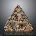 Triangular Carved Terracotta Artifact With Spiral Patterns And Hollow Decorative Design