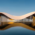 Contemporary Architectural Building With White And Yellow Geometric Design Glass Curtain Walls And Water Reflection