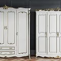 White Wardrobes With Golden Carved Accents Against Dark Walls And Wooden Floor