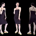 A Woman in Dark Strappy Dress With Colorful Platform Sandals Against Black Background