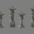 Traditional Stone Pagoda Style Outdoor Lanterns with Intricate Carved Bases and Decorative Tops