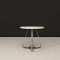Modern Side Table With White Round Top And Sleek Metal Legs Design