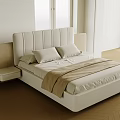 Modern Double Bed Featuring Upholstered Headboard Light Colored Bedding and Bedside Table