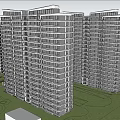 Modern High Rise Residential Buildings With Trees And People In Surroundings